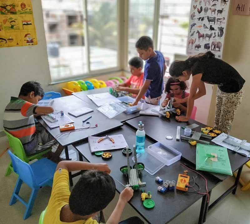 Kids in a robotics workshop